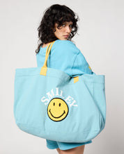 Smiley Chasing Happiness Tote Bag