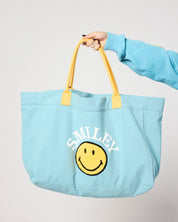 Smiley Chasing Happiness Tote Bag