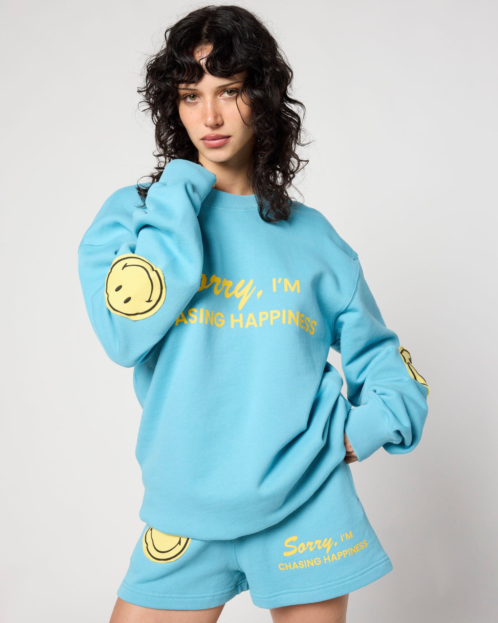 Smiley Chasing Happiness Crewneck