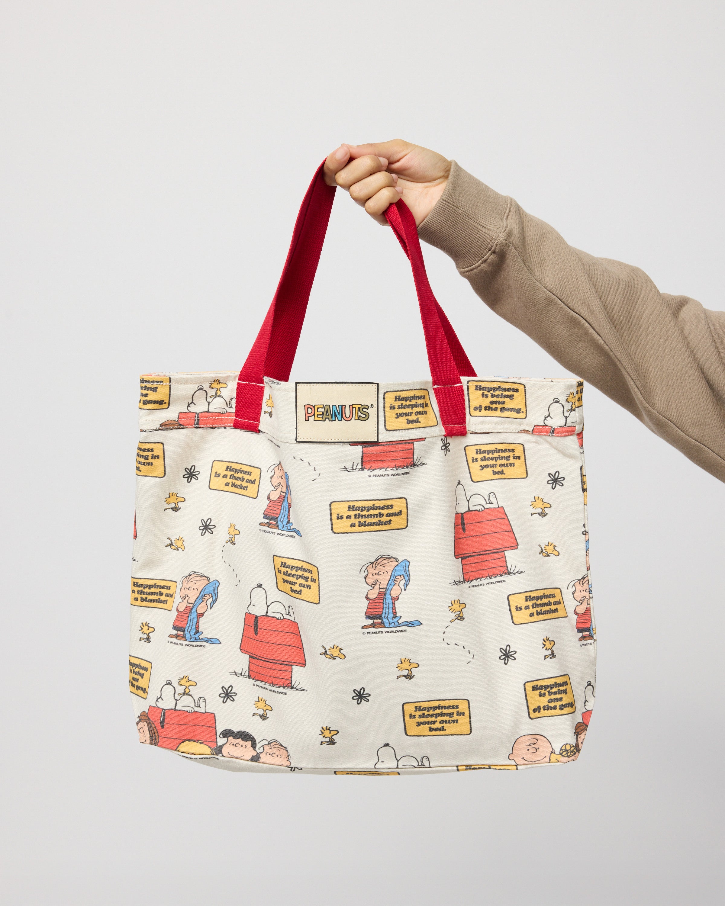 Peanuts The Meaning Of Happiness Tote Bag