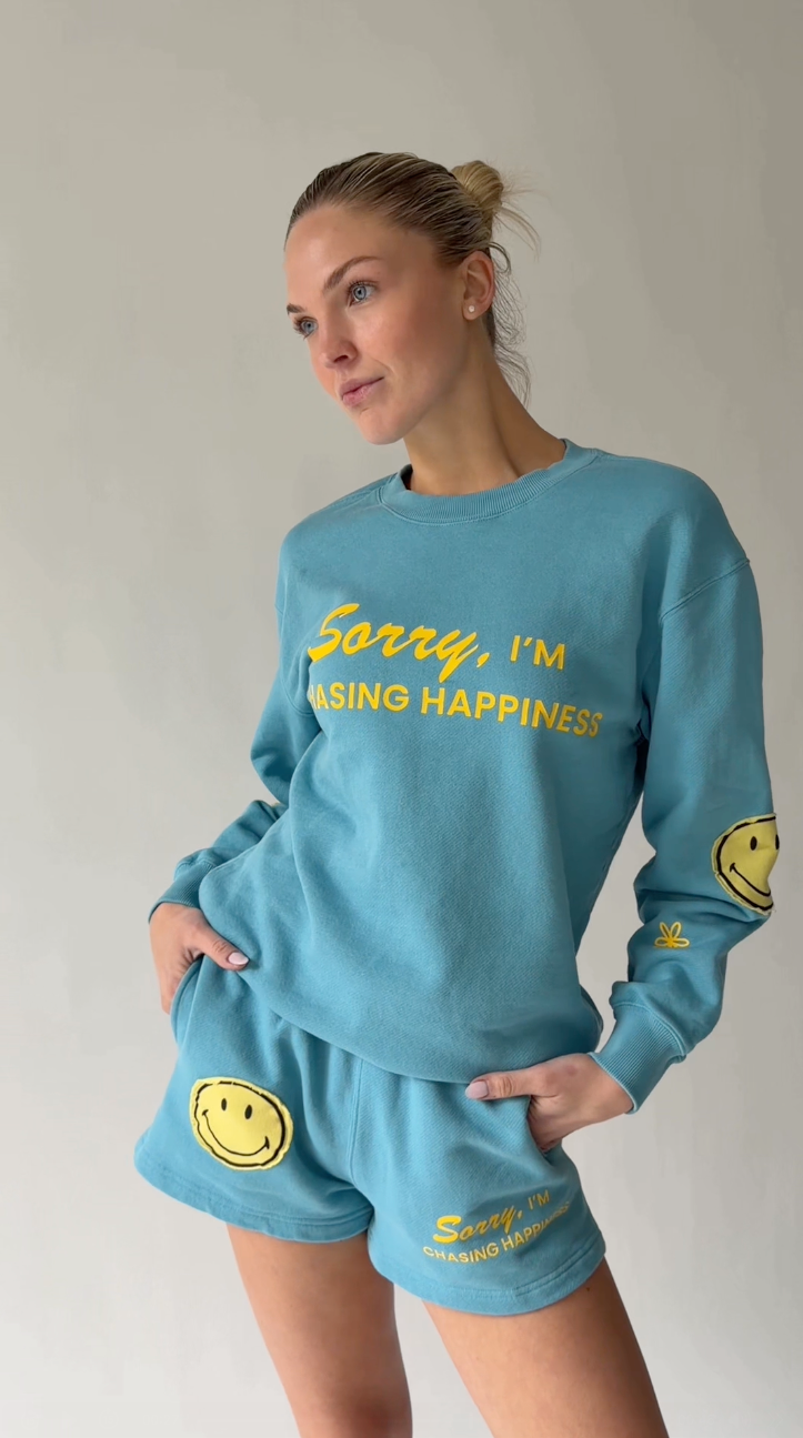 Smiley Chasing Happiness Crewneck