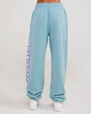 teal sweatpants with gratitude graphic