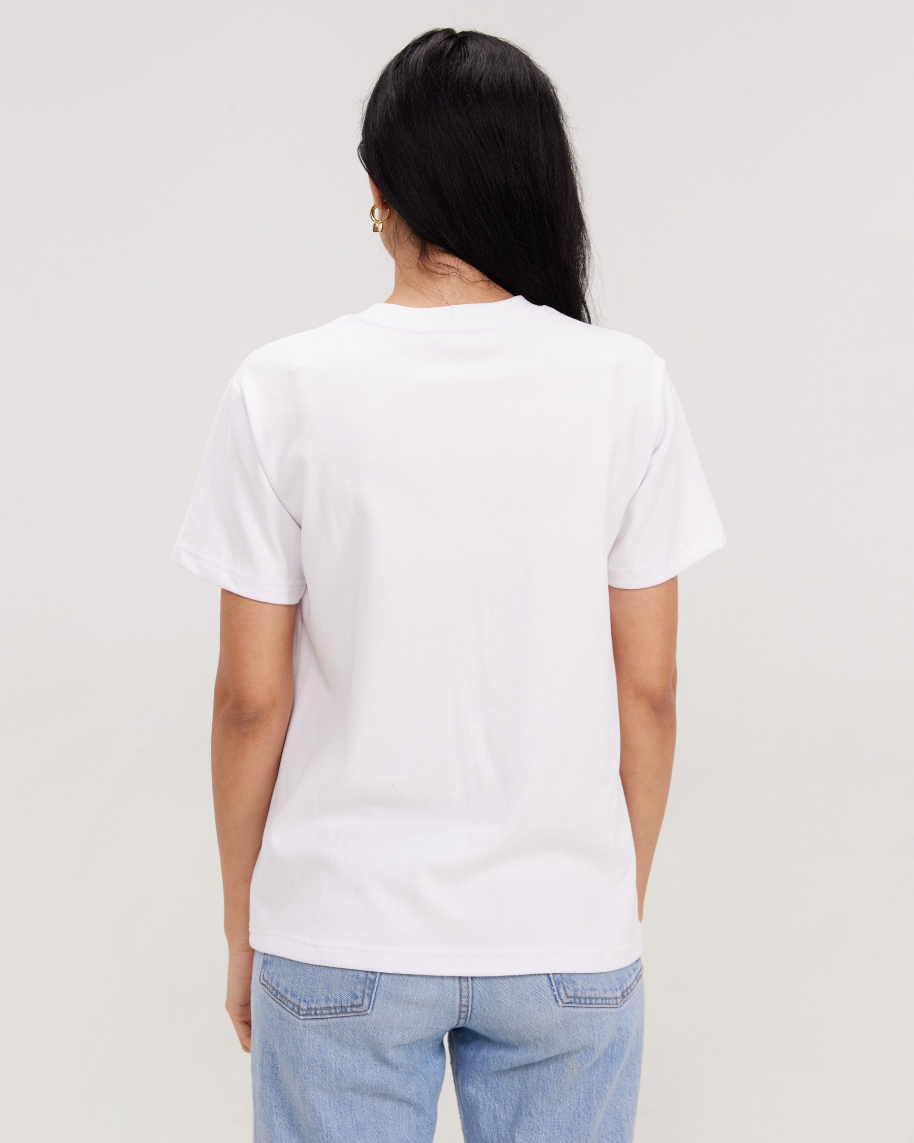 white t-shirt with fragile graphic and heart