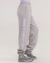 grey smiley face fleece sweatpants