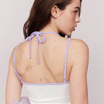 white spandex dress with purple straps